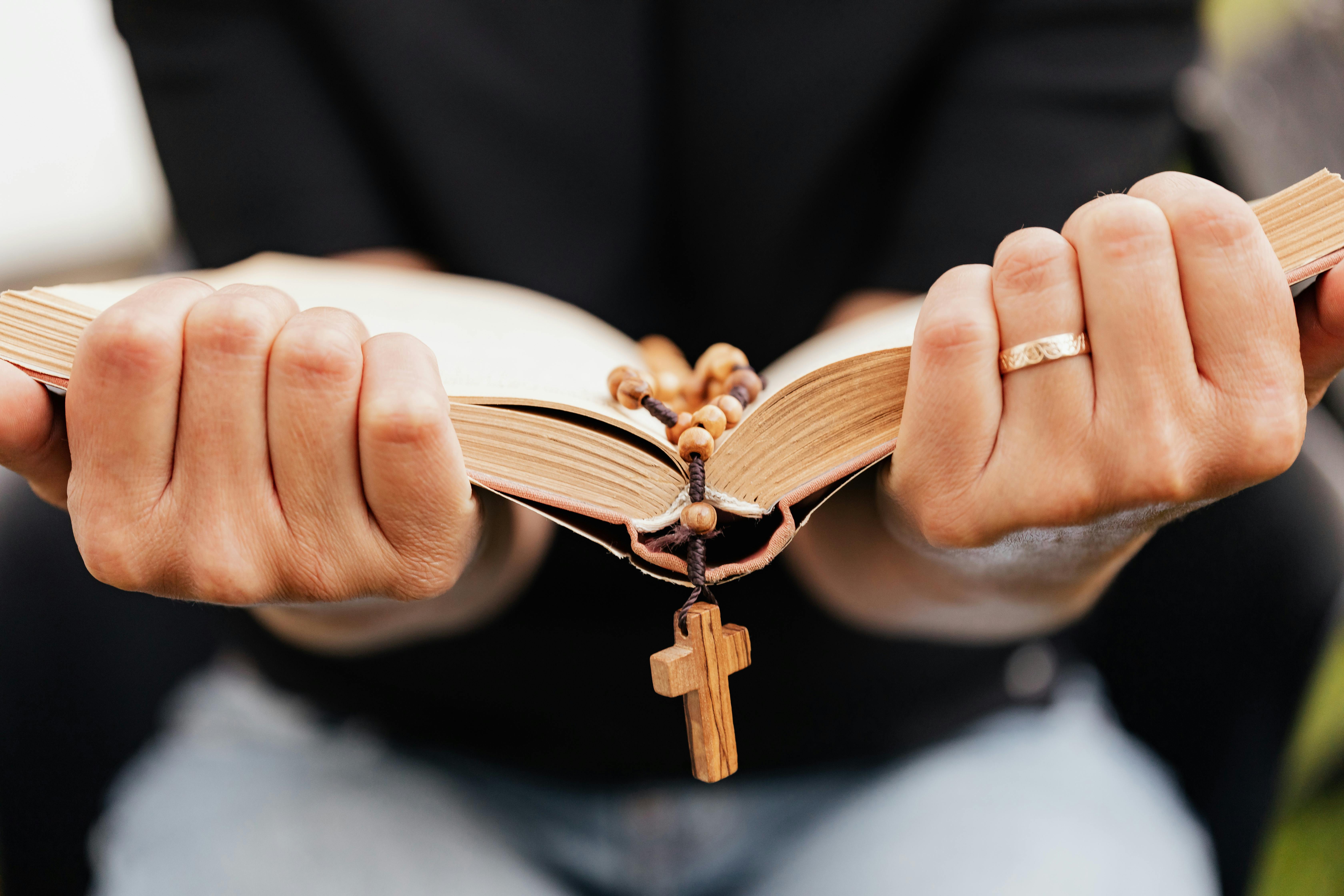 Hands holding scripture